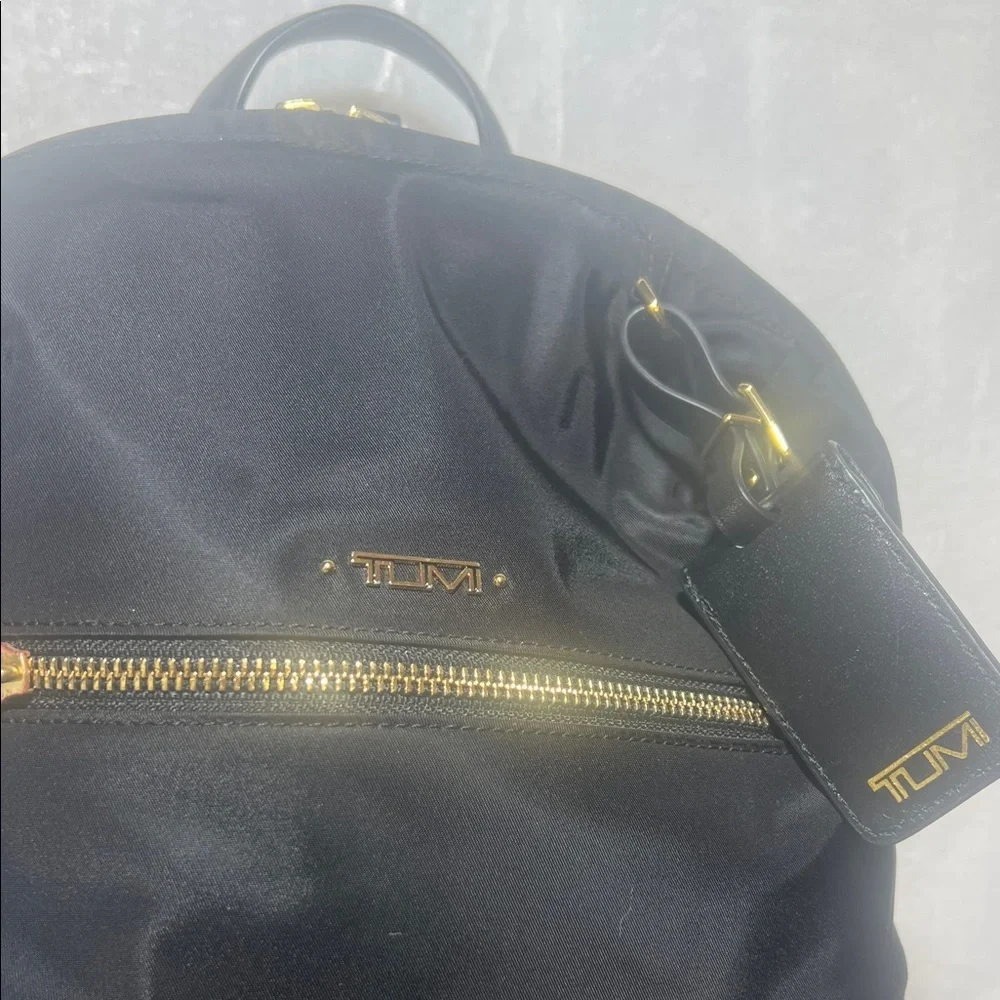 Tumi Halle Black Backpack with Gold Accents